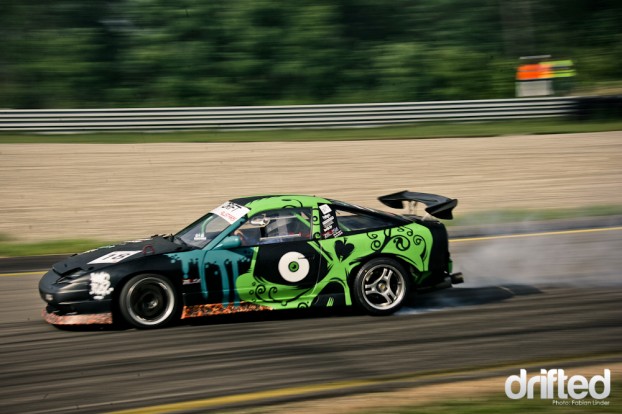 Sebastien Namur, graffiti artist, painted Cerdan Nicolas S13 with a big, green skull