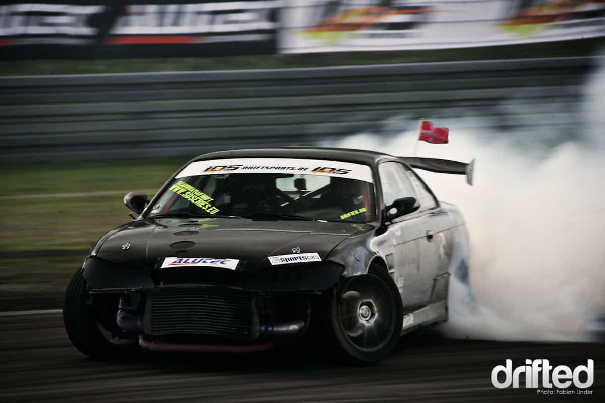 EVENT: IDS Round 5: The Ring: Part II - Image ... and through the Dunlop turn, the car was always followed by a big white cloud