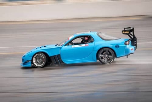blue widebody rx7 feature
