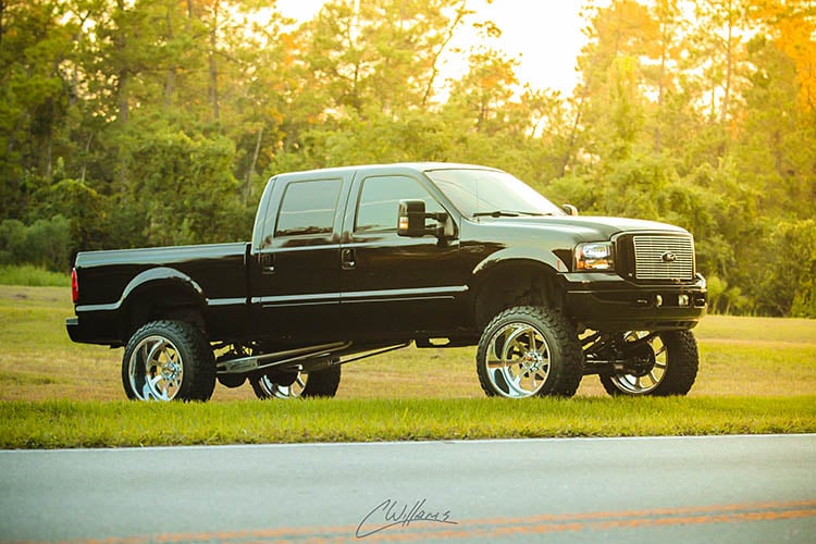 ford black pickup f250 raised 24 inch 6.0 powerstroke