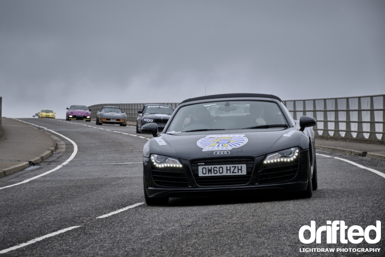 audi r8 leads car convoy