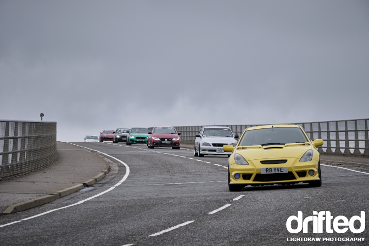 toyota celica leads car convoy